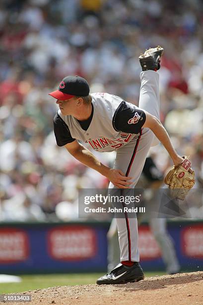 Brian Reith of the Cincinnati Reds pitches against the Cleveland Indians during the MLB game on June 13, 2004 at Jacobs Field in Cleveland, Ohio. The...