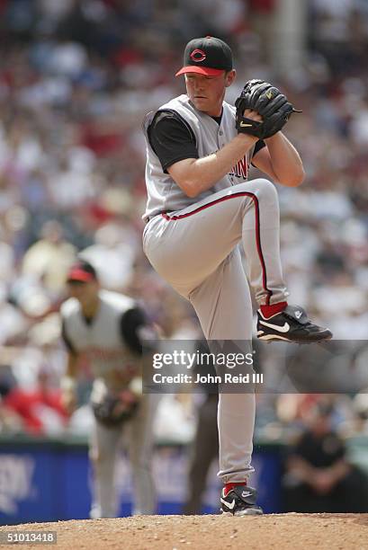 Mike Matthews of the Cincinnati Reds pitches against the Cleveland Indians during the MLB game on June 13, 2004 at Jacobs Field in Cleveland, Ohio....