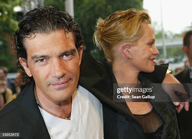 Antonio Banderas and Melanie Griffith arrive at the German premiere of "Shrek 2" on June 30, 2004 in Hamburg, Germany.