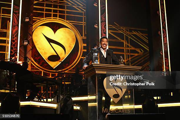 Honoree Lionel Richie accepts his award onstage during the 2016 MusiCares Person of the Year honoring Lionel Richie at the Los Angeles Convention...