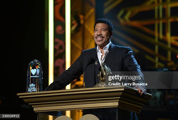 Honoree Lionel Richie accepts his award onstage during the 2016 MusiCares Person of the Year honoring Lionel Richie at the Los Angeles Convention...