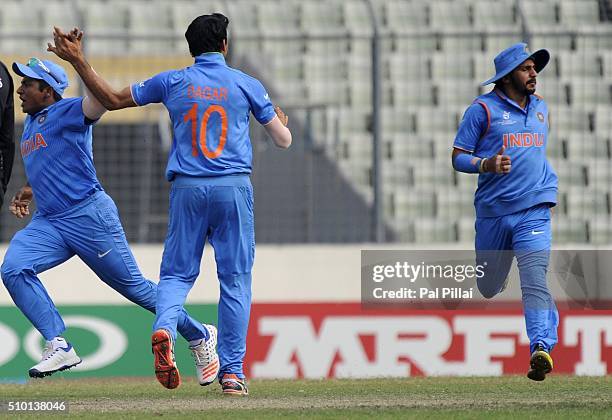 Mayank Dagar of India celebrates the wicket of Shamar Springer of West Indies U19 during the ICC U19 World Cup Final Match between India and West...