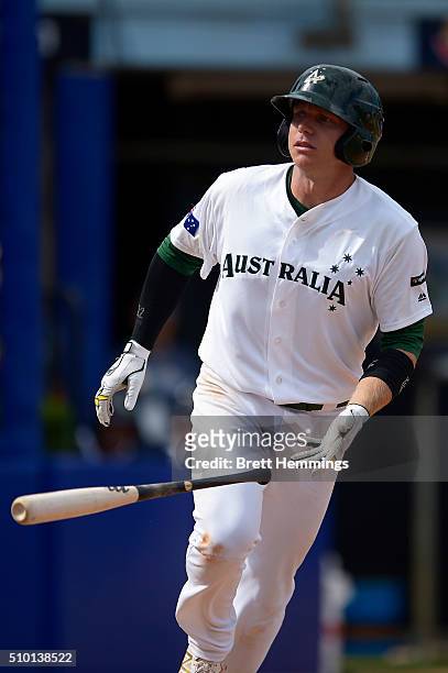 Luke Hughes of Australia is walked to first base during the World baseball Classic Final match between Australia and South Africa at Blacktown...