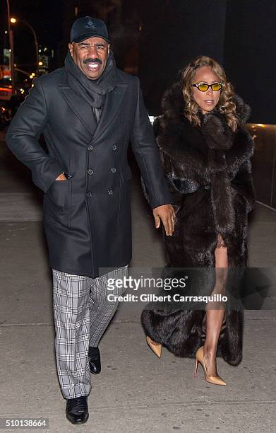 Comedian, television host, radio personality, actor, author Steve Harvey and wife Marjorie Harvey are seen outside the Altuzarra Fall 2016 fashion...