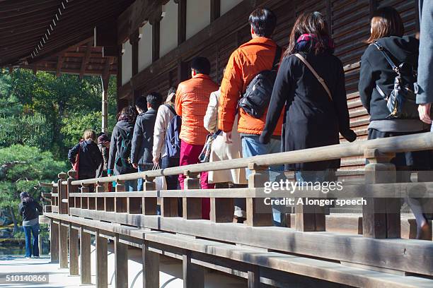 Queue In House Queue Of People Outside House Photos and Premium High Res Pictures ...