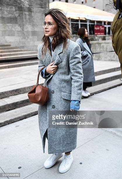 Miroslava Duma is seen outside the Alexander Wang show wearing a grey coat during New York Fashion Week: Women's Fall/Winter 2016 on February 13,...