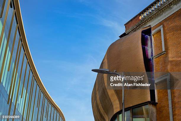 Curved brick addition to the Crawford Art Gallery, Cork, Ireland, designed by Dutch architect Erick van Egeraat contrasts with the older section of...