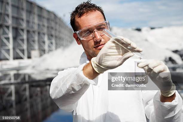 scientist at work - water sample stock pictures, royalty-free photos & images