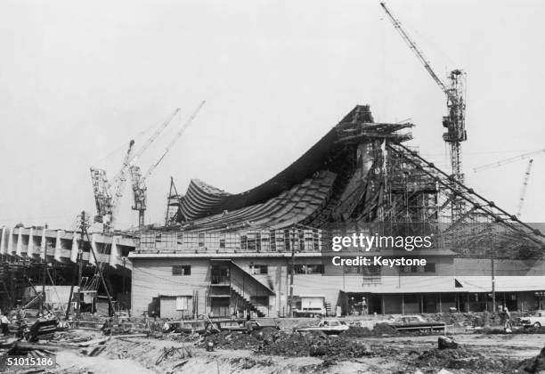 The construction of the National Gymnasium of the Olympic Village at Yoyogi in Tokyo, where the athletes will live for the duration of the games, 6th...