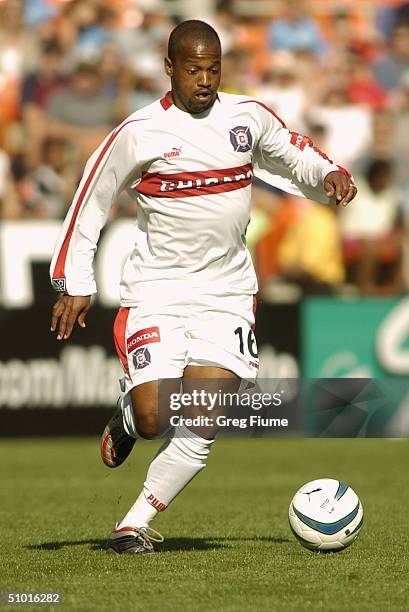 Midfielder Andy Williams of the Chicago Fire dribbles the ball against the D.C. United during the game at RFK Stadium on April 24, 2004 in...