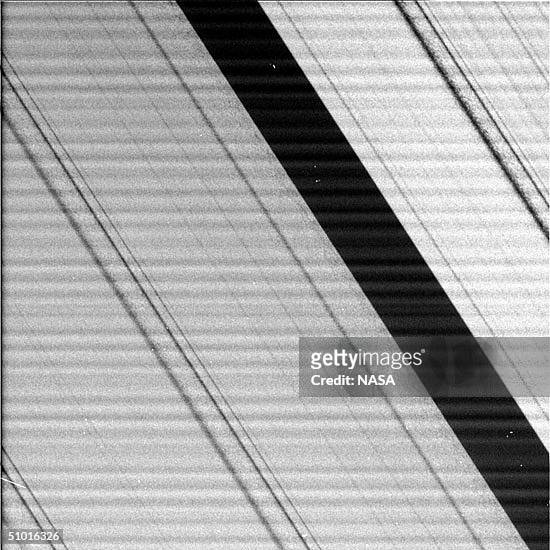 This NASA handout photo taken by the Cassini spacecraft on July 1, 2004 shows a portion of Saturn's rings up close. Cassini is the first spacecraft...