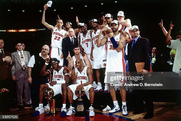 The Detroit Pistons team poses for a picture after their win over the Los Angeles Lakers in game five of the 2004 NBA Finals at The Palace of Auburn...