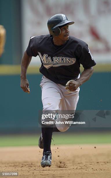 Center fielder Juan Pierre of the Florida Marlins runs the bases during the MLB game against the St. Louis Cardinals at Busch Stadium on May 16, 2004...