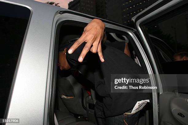 Rapper Ja Rule leaves the Criminal Courthouse after being released on bail after getting arrested early this morning in possession of marijuana and...