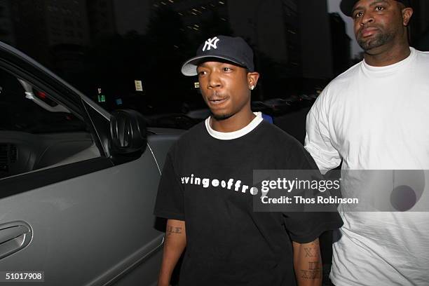 Rapper Ja Rule leaves the Criminal Courthouse after being released on bail after getting arrested early this morning in possession of marijuana and...