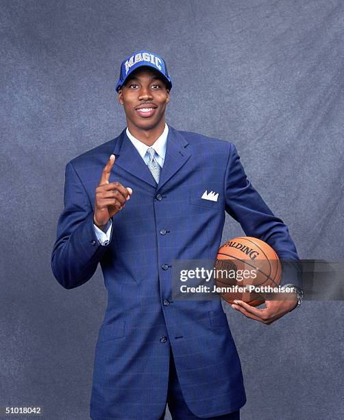 Dwight Howard of the Orlando Magic poses during the 2004 NBA Draft Portraits at Madison Square Garden on June 24 in New York, New York. NOTE TO USER:...