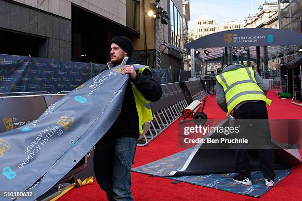 Branding boards are assembled ahead of the 69th EE British Academy Film Awards at The Royal Opera House on February 14, 2016 in London, England.