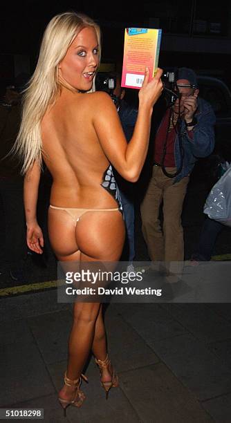 Model Anna Taverner attends Colin Butts' book launch party painted in tire Tracks on July 1, 2004 at Embassy Club in London. Butts' new Ibiza...
