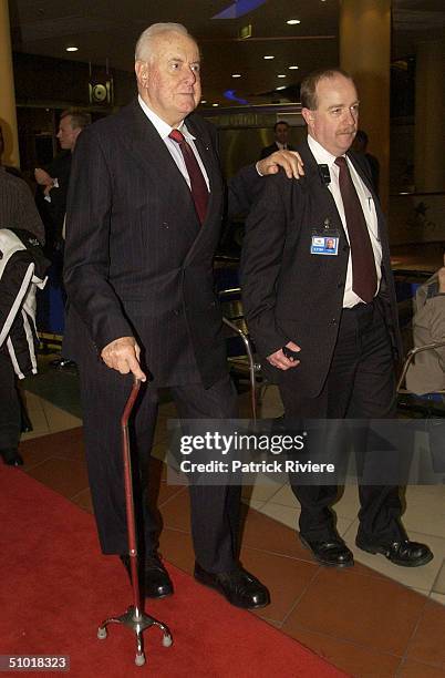 Former Australian Prime Minister Gough Whitlam arrives on the red carpet at the opening night of "Saturday Night Fever" on July 1, 2004 at the Lyric...