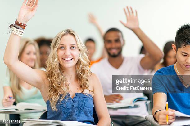 Student Glass Rise Hand 700 College Classroom Raising Hand Stock Photos, High-Res Pictures, and ...