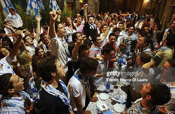 The Contradaioli belonging to the Onda one of the seventeen contrade, gather together in the heart of the Contrada, where they have a large dinner to...