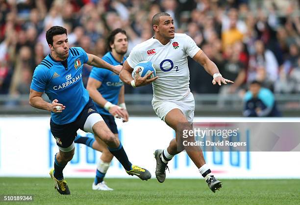 Jonathan Joseph of England runs in his team's second try during the RBS Six Nations match between Italy and England at the Stadio Olimpico on...