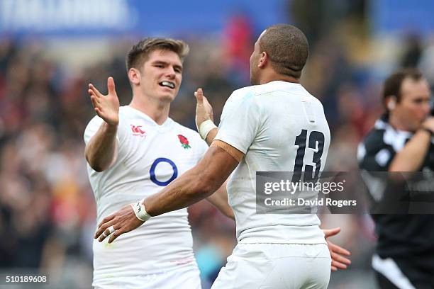 Jonathan Joseph of England is congratulated by teammate Owen Farrell of England after scoring his team's second try during the RBS Six Nations match...