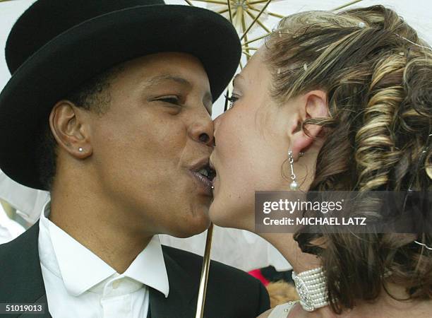 Singer-songwriter Marla Glen and her partner Sabrina Conley kiss after their wedding at the town hall of the southern town of Heilbronn, 02 July...