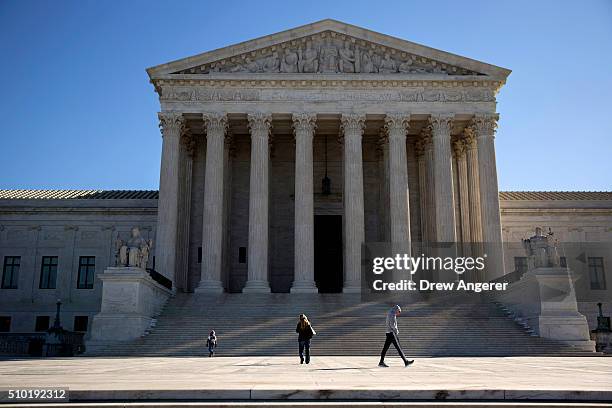 Visitors walk outside the U.S. Supreme Court following the death of Supreme Court Justice Antonin Scalia February 14, 2016 in Washington, DC. Supreme...