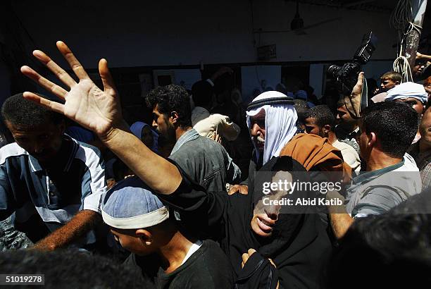 Palestinian family mourns their 25 year-old relative Yassir al-Arja, a scrap dealer from Rafah's Brazil neighborhood, who was shot dead whilst...