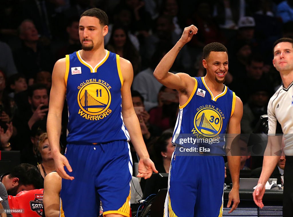Klay Thompson and Stephen Curry of the Golden State Warriors react