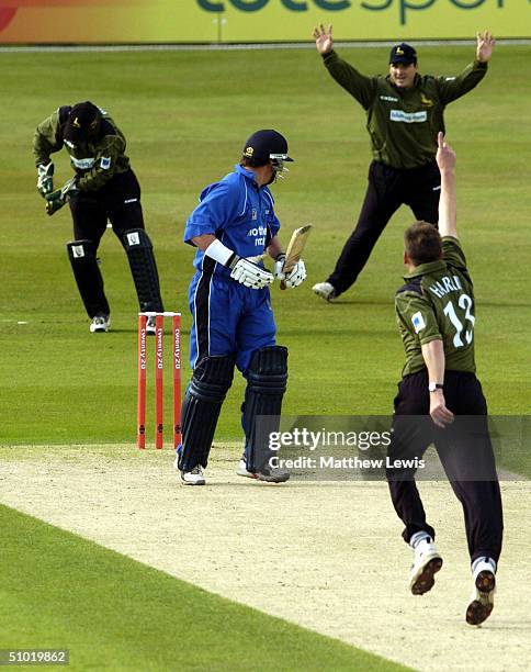 Marcus North of Durham looks on after his shot was caught by Chris Read of Nottinghamshire off Andrew Harris during the Twenty20 Cup Match between...