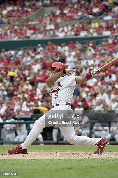 Albert Pujols of the St. Louis Cardinals bats during the MLB game against the Cincinnati Reds at Busch Stadium on June 20, 2004 in St. Louis,...