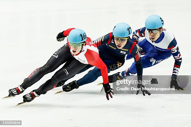 Jiwon Park of South Korea , Charle Cournoyer of Canada and Semen Elistratov of Russia cross the finish line in the 1000m Mens Final during ISU Short...