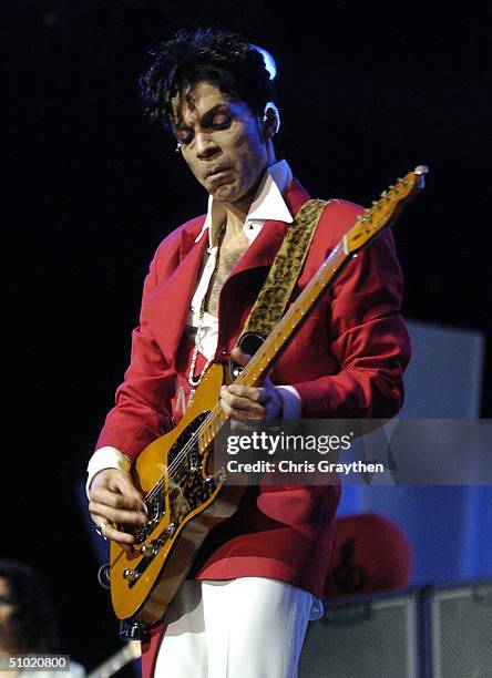 Prince performs at the 10th Anniversary Essence Music Festival at the Superdome on July 2, 2004 in New Orleans, Louisiana.