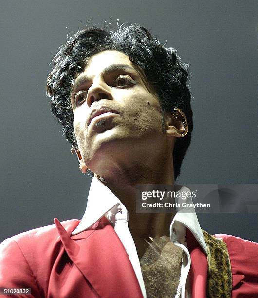 Prince performs at the 10th Anniversary Essence Music Festival at the Superdome on July 2, 2004 in New Orleans, Louisiana.