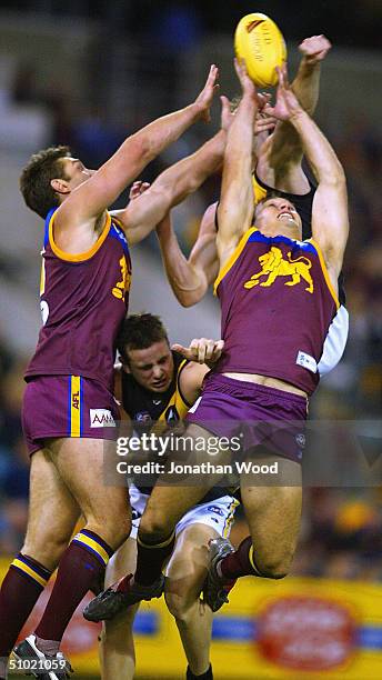 Daniel Bradshaw of the Lions takes the mark during the AFL match between the Brisbane Lions and Richmond Tigers at the Gabba, on July 3, 2004 in...