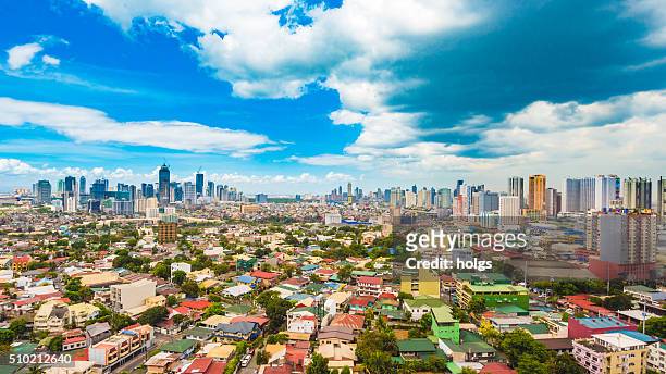 metro manila skyline during the day - philippines stock pictures, royalty-free photos & images