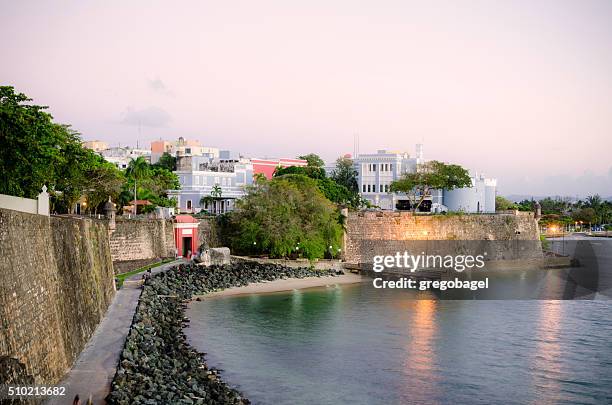 old san juan wall in puerto rico at night - old san juan wall stock pictures, royalty-free photos & images