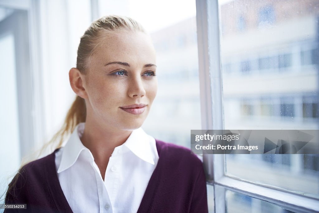 Thoughtful businesswoman in office