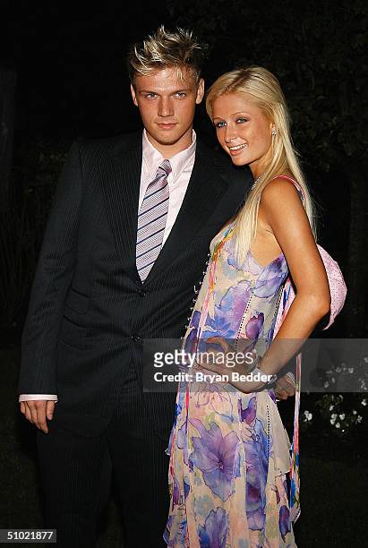 Singer Nick Carter and Paris Hilton arrive to celebrate the launch of her new label "Heiress Records" at the PlayStation 2 estate July 2, 2004 in...