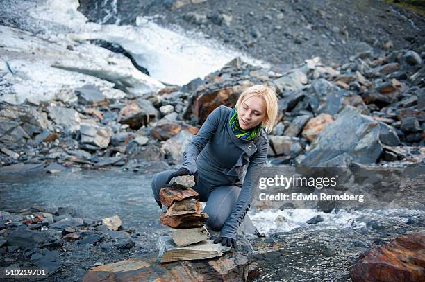 rock stacking photos and premium high res pictures -... Person Stacking Rocks Photos and Premium High Res Pictures - Getty Images