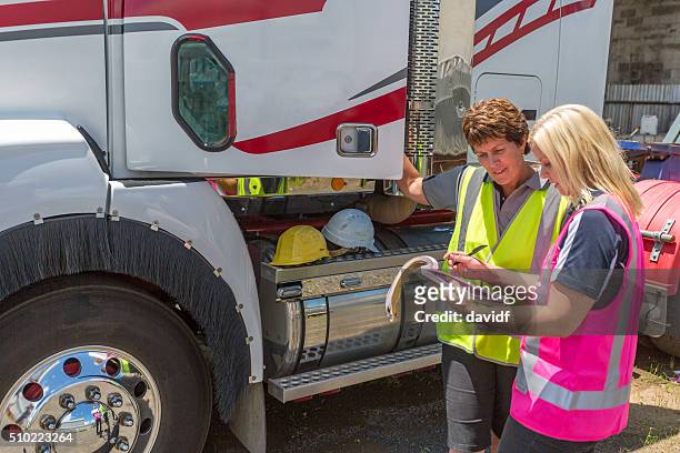 women working in the transport industry wearing hi-vis clothes - trucking stock pictures, royalty-free photos & images