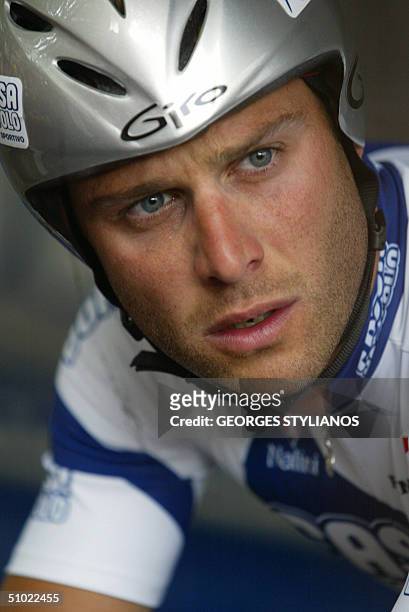 Italian Alessandro Petacchi concentrates before starting the prologue of the 91st Tour de France cycling race, 03 July 2004 in Liege. Swiss Fabian...