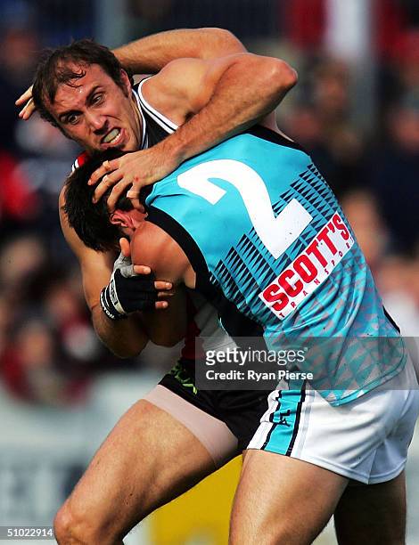 Fraser Gehrig for the Saints clashes with Darryl Wakelin for the Power during the round fourteen AFL match between The St.Kilda Saints and The Port...