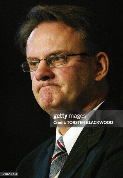 This file photo taken 07 April 2004 shows Australia's opposition leader Mark Latham pondering a difficult question from the floor after delivering...