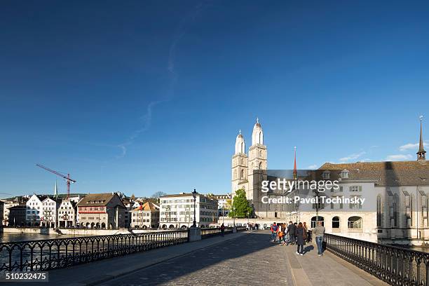 famous grossmünster romanesque cathedral, zurich - grossmunster cathedral stock pictures, royalty-free photos & images