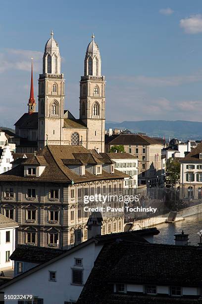 famous grossmünster romanesque cathedral, zurich - grossmünster stock-fotos und bilder