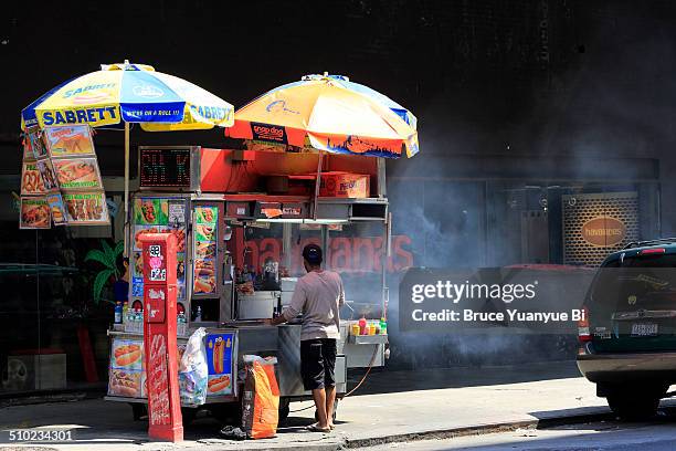 a food cart in meatpacking district - würstchenstand stock-fotos und bilder