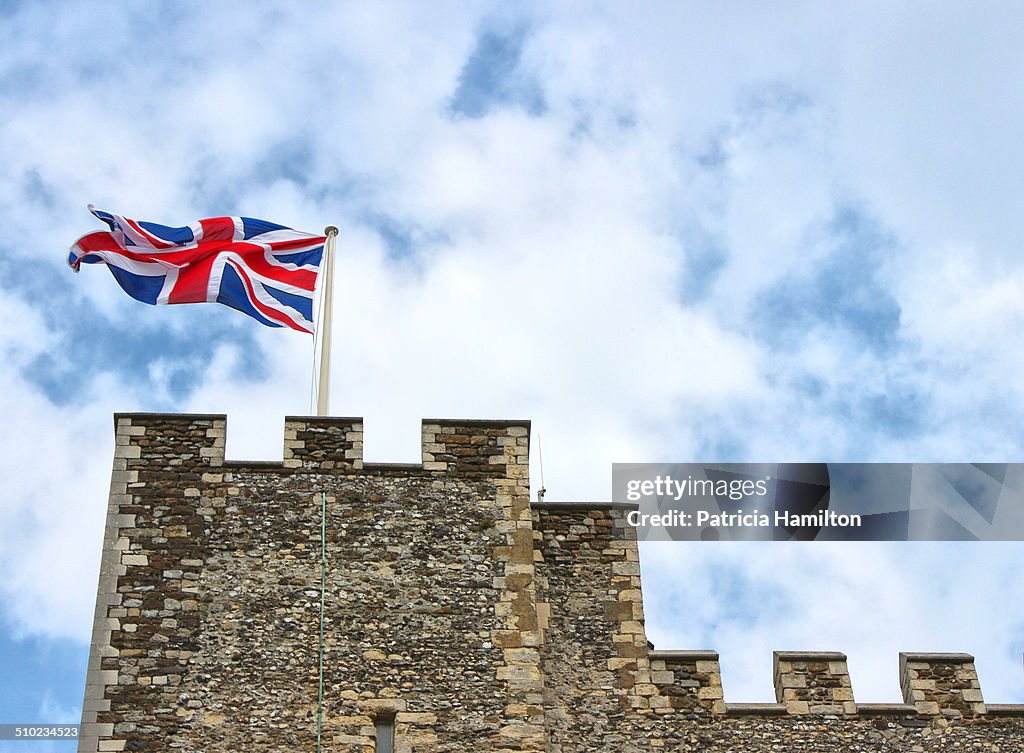 Union flag flying on a castle tower
